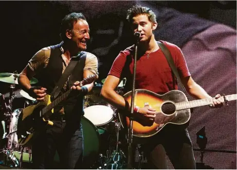  ?? Ruth Barohn ?? Texas A&M University student Matthew Aucoin, right, got to perform “No Surrender” onstage with Bruce Springstee­n.