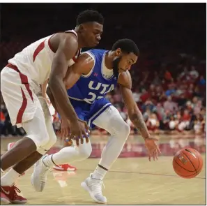  ?? NWA Democrat-Gazette/ANDY SHUPE ?? Arkansas forward Adrio Bailey (left) was among those who stepped up when Daniel Gafford got his fourth foul with 9:26 left Friday against Texas-Arlington and had to sit on the bench. Bailey scored seven of his 14 points in that stretch to help the Razorbacks earn a 78-60 victory.