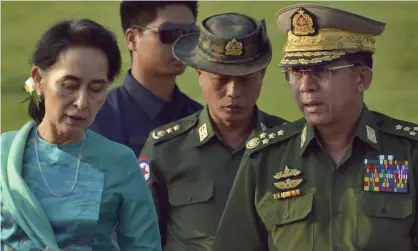  ?? Photograph: Aung Shine Oo/AP ?? Aung San Suu Kyi with Min Aung Hlaing, right, who made ‘a serious miscalcula­tion’ when he launched the coup.
