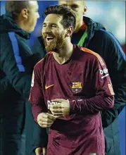  ??  ?? Lionel Messi of FC Barcelona and his teammates relish winning the La Liga title after defeating Deportivo La Coruna on April 29 in La Coruna, Spain.