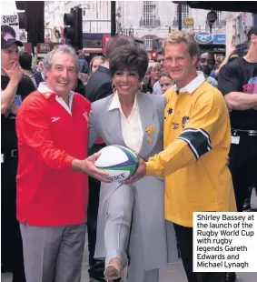  ??  ?? Shirley Bassey at the launch of the Rugby World Cup with rugby legends Gareth Edwards and Michael Lynagh