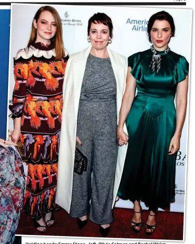  ??  ?? Holding hands: Emma Stone, left, Olivia Colman and Rachel Weisz