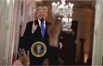  ?? EVAN VUCCI/AP ?? President Donald Trump took a midterm victory lap Wednesday at the White House during a raucous news conference that stretched to nearly 90 minutes.