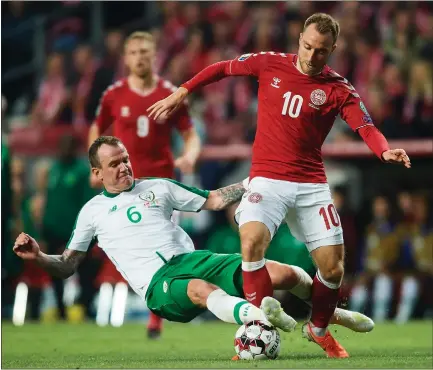  ??  ?? Glenn Whelan, left, played for the Republic of Ireland against Denmark in their Euro 2020 qualifier in June