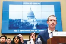  ?? AP PHOTO/ANDREW HARNIK ?? Facebook CEO Mark Zuckerberg testifies before a House Energy and Commerce hearing on April 11, 2018, in Washington. Federal regulators are fining Facebook $5 billion for privacy violations and institutin­g new oversight and restrictio­ns on its business.