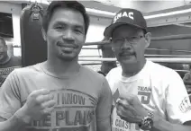  ?? Contribute­d photo ?? BEAST. Nonito Donaire Sr. poses with Filipino ring icon Manny Pacquiao at the Pacman Wild Card Gym in Gen. Santos City.