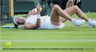  ?? Photo / AP ?? Garbine Muguruza was floored by Alison Van Uytvanck’s combinatio­n of power, variety and daring.