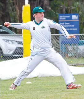  ??  ?? Hallora’s Lachlan Pratt throws the ball back after saving a boundary against Yarragon in division one.