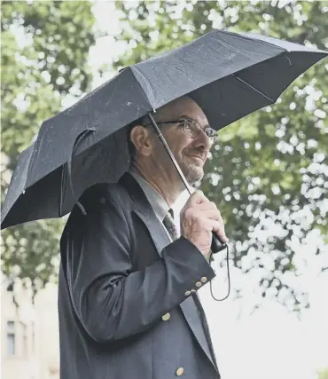  ??  ?? Richard Sivier seen leaving Westminste­r Magistrate­s’ Court in London after being sentenced