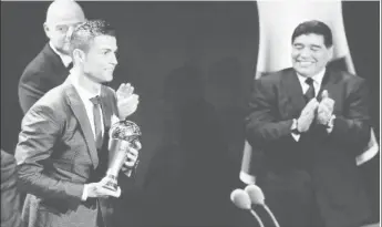  ??  ?? Cristiano Ronaldo receiving his award.