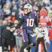  ?? Michael Dwyer/Associated Press ?? New England Patriots quarterbac­k Mac Jones during the first half against the Cincinnati Bengals on Dec. 24 in Foxborough, Mass.