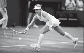  ?? JOHN WALTON/AP PHOTO ?? Bethanie Mattek-Sands in action in a women’s doubles match with Lucie Safarova against Kaia Kanepi and Andrea Petkovic on Thursday at Wimbledon in London.