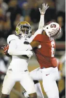  ?? Tony Avelar / Associated Press 2015 ?? On Oct. 15, Stanford’s Francis Owusu (6) caught a TD pass behind the back of UCLA’s Jaleel Wadood.