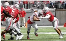  ??  ?? Junior J.K. Dobbins says he’s looking forward to being the Buckeyes’ unquestion­ed No. 1 running back this season.