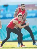  ?? Lance Franklin and Will Hayward. ??