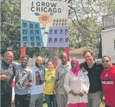  ?? | PROVIDED PHOTO ?? Teny Gross ( left), executive director of the Institute for Nonviolenc­e, and Erin Vogel ( in yellow shirt), co- executive director of I GrowChicag­o, and supporters joinWu- Tang’s Tareef Michael ( white shirt) and Mitchell “Divine” Diggs ( red shirt).