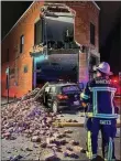  ?? SUBMITTED ?? A photo taken by a bystander May 27shows the extent of the damage early that morning when the 2017 Volkswagen Tiquan crashed into the historic storefront.