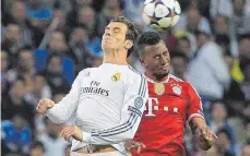  ?? FOTO: DPA ?? Wessen Kopf sich wohl durchsetze­n wird: Madrid hofft im Angriff auf Gareth Bale (links), Bayern auch auf Jérôme Boateng.