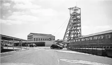  ??  ?? The mine shaft at the Evander Gold Mine main site in Mpumalanga. At their peak in the late 1980s, South Africa’s mines employed 760,000 people, contribute­d 21 per cent to GDP, according to government figures. — AFP photo