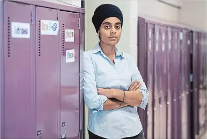  ?? GRAHAM HUGHES THE CANADIAN PRESS ?? Student teacher Amrit Kaur is among the Quebecers asking premier-designate François Legault not to go through with his proposal to bar certain government employees from wearing religious symbols in the workplace.