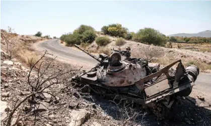  ?? ?? A damaged military vehicle lies abandoned on a road near Humera, Ethiopia, in November 2020. Photograph: Eduardo Soteras/AFP/ Getty Images