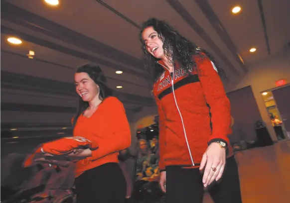  ?? THE CANADIAN PRESS/TODD KOROL PHOTO ?? Shannon Szabados walks into the room as she is named to the Canadian women’s Olympic hockey team by Hockey Canada and the Canadian Olympic Committee at a press event in Calgary, Friday afternoon.