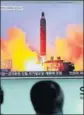  ?? AP ?? Footage of a 2016 missile launch on a TV screen.
