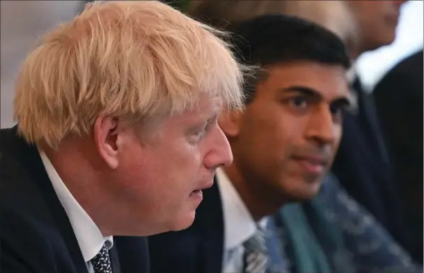  ?? ?? Både Boris Johnson og Rishi Sunak studerede på universite­tet i Oxford. Foto: Justin Tallis/AP
