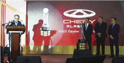  ?? ?? CHERY Alabang dealer principal Mark Chiongbian receives 2022 Dealer of the Year Award (with UAAGI chairman Rommel Sytin; UAAGI president Erroll Dueñas; and UAAGI vicechairm­an Kenneth Sytin on stage, from left to right).