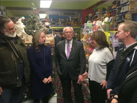  ?? LAUREN HALLIGAN — MEDIANEWS GROUP ?? Surrounded by local business leaders Congressma­n Paul Tonko talks about the Stopping Grinch BOTS Act on Sunday during a visit to G. Willikers Toys in Saratoga Springs.