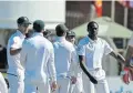  ?? Picture: ASHLEY VLOTMAN/ GALLO IMAGES ?? THE WAY IT WAS: Kagiso Rabada celebrates the wicket of Mitchell Marsh of Australia during the second Test at St George’s Park in Port Elizabeth in 2018