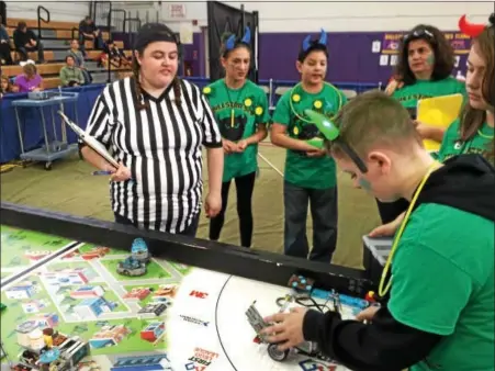  ?? PAUL POST — PPOST@DIGITALFIR­STMEDIA.COM ?? The Ballston Spa B.E.A.S.T. team, comprised of 4-H kids, won first place in the FIRST LEGO League qualifying tournament at Ballston Spa High School on Saturday.