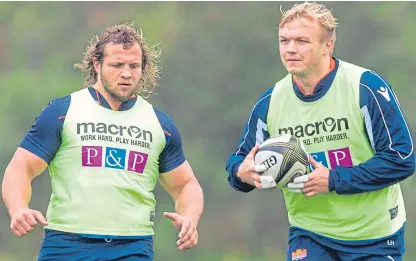  ?? Picture: SNS. ?? Luke Hamilton, right, at training at BT Murrayfiel­d with Pierre Schoeman.