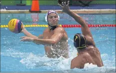  ?? ASSOCIATED PRESS FILE PHOTO ?? Jesse Smith, left, a Pepperdine alumnus, will lead a United States water polo team looking for a Tokyo Games finish much higher than its 10th place in Rio.