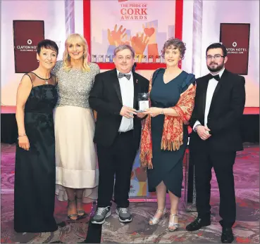  ?? ?? Bill Power, Anne Morrisson and Andrew Dineen, accepting the Pride of Cork Award 2022 on behalf of St George’s Arts & Heritage Centre, from Patricia Messenger and Miriam O’Callaghan last Friday night.