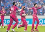  ??  ?? West Indies’ bowling didn’t make for a great reading despite a good start as they oversteppe­d thrice on Friday. PTI