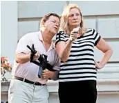  ?? LAURIE SKRIVAN/ST. LOUIS POST-DISPATCH ?? Mark and Patricia McCloskey face a felony charge for displaying guns during a racial injustice protest in June.