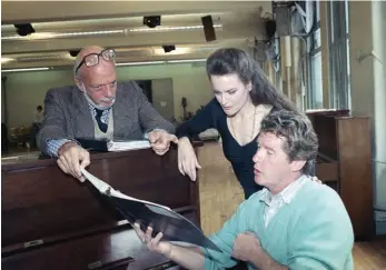  ??  ?? “Phantom” Stirrings Prince, Dale Kristien and Michael Crawford rehearse Andrew Lloyd Webber’s “The Phantom of the Opera” in New York in 1989. Prince won a Tony for directing the show.