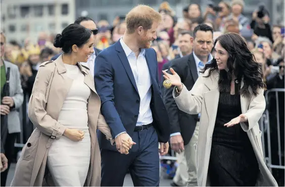  ?? Photo / Dean Purcell ?? Prime Minister Jacinda Ardern (right) accompanie­d Meghan, Duchess of Sussex, and Prince Harry on their Viaduct walkabout.