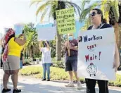  ?? RICARDO RAMIREZ BUXEDA/ORLANDO SENTINEL ?? Protesters demand payment and processing of unemployme­nt benefits.