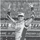  ??  ?? Kyle Busch celebrates Sunday after winning the NASCAR Cup Series race in Fort Worth, Texas. LARRY PAPKE/AP