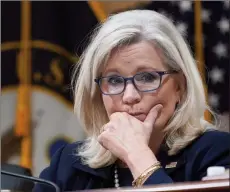  ?? SCOTT APPLEWHITE/The Associated Press ?? Vice Chair Liz Cheney, R-Wyo., listens as the House select committee investigat­ing the Jan. 6, 2021 attack on the Capitol holds a hearing at the Capitol in Washington, Thursday, June 16, 2022. The traumas of Watergate and Jan. 6 are a half century apart, in vastly different eras, and they were about different things. But in both episodes, a president tried to do an end run around democracy. Friday is the 50th anniversar­y of the Watergate break-in that eventually consumed Richard Nixon's presidency.