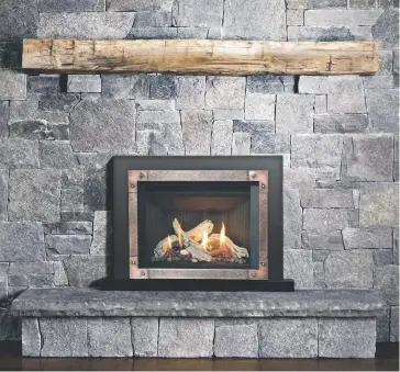  ??  ?? Visit Chadwicks &amp; Hacks to view this fireplace with driftwood logs.