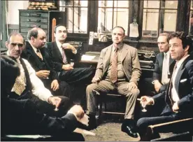  ??  ?? ALL IN THE FAMILY: (above, from left) Abe Vigoda as Tessio, Richard Castellano as Clemenza, John Cazale as Fredo, Marlon Brando as Don Vito Corleone, Robert Duvall as Tom Hagen and James Caan as Sonny. Castellano (right) was the only one who refused to...