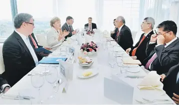  ??  ?? Prime Minister Datuk Seri Najib Tun Razak partakes in a luncheon hosted by Chancellor Angela Merkel at The Federal Chanceller­y Tuesday. Najib, who is also Finance Minister, arrived in Germany’s capital on Monday for a three-day official visit to...