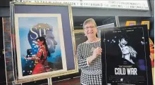  ?? MIKE ZETTEL NIAGARA THIS WEEK ?? Gisele Fleury-Fournier with posters of films being shown at the Seaway Mall Cineplex Odeon during the Welland Internatio­nal Film Festival.