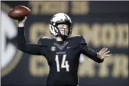  ?? MARK HUMPHREY — THE ASSOCIATED PRESS ?? Vanderbilt quarterbac­k Kyle Shurmur (14) throws a pass against Mississipp­i during the second half of an NCAA college football game Saturday, Nov. 17, 2018, in Nashville, Tenn. Vanderbilt won 36-29 in overtime.