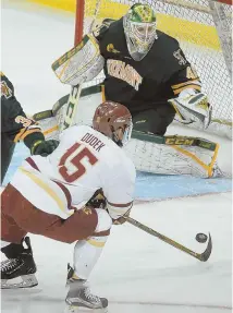  ?? HERALD PHOTO BY JIM MICHAUD ?? HEATING UP: Boston College’s JD Dudek had two power-play goals during Saturday night’s 7-4 rout of Vermont at Conte Forum, which clinched the series.