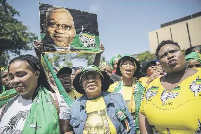  ?? Picture: AFP ?? BEHIND THEIR MAN. Supporters of embattled former president Jacob Zuma outside the KwaZulu-Natal High Court in Pietermari­tzburg yesterday.