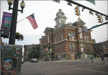  ?? MADDIE MCGARVEY / THE NEW YORK TIMES ?? Voters in Athens, Ohio, imposed a carbon fee on themselves in 2018.